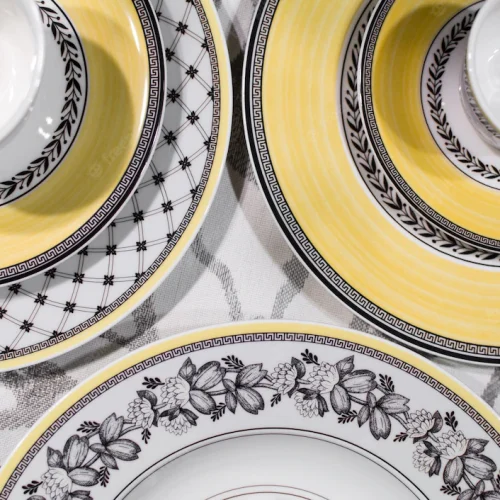 beautiful-antique-elegant-white-porcelain-plates-with-yellow-black-unique-geometric-pattern_656188-222
